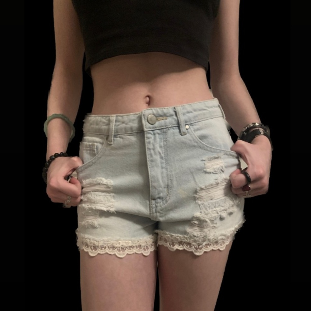 light wash jean shorts with lace detail